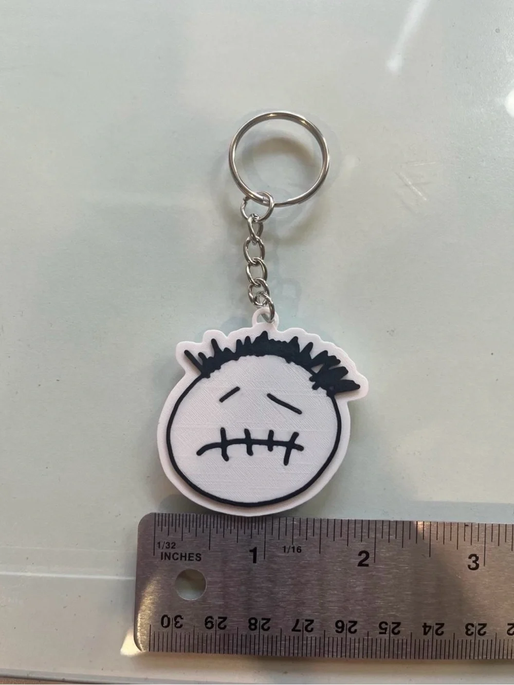 White & Black Sad Face Keychain with Metal Ring